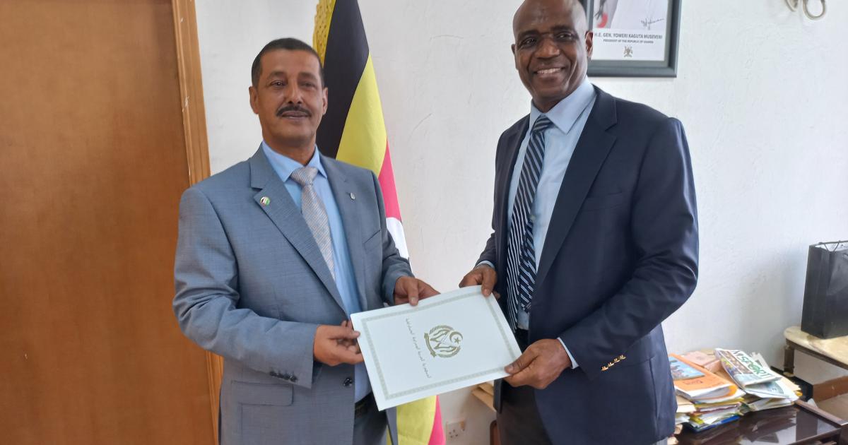 Ambassador Nafei Rais presents copies of his credentials as extraordinary and plenipotentiary ambassador to Uganda